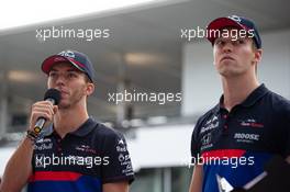 (L to R): Pierre Gasly (FRA) Scuderia Toro Rosso with team mate Daniil Kvyat (RUS) Scuderia Toro Rosso. 10.10.2019. Formula 1 World Championship, Rd 17, Japanese Grand Prix, Suzuka, Japan, Preparation Day.