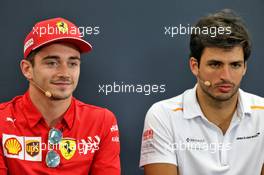 (L to R): Charles Leclerc (MON) Ferrari with Carlos Sainz Jr (ESP) McLaren in the FIA Press Conference. 10.10.2019. Formula 1 World Championship, Rd 17, Japanese Grand Prix, Suzuka, Japan, Preparation Day.