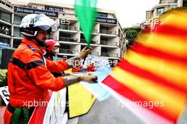Marshals wave their flags. 24.05.2019. Formula 1 World Championship, Rd 6, Monaco Grand Prix, Monte Carlo, Monaco, Friday.