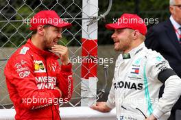 (L to R): Sebastian Vettel (GER) Ferrari in parc ferme with Valtteri Bottas (FIN) Mercedes AMG F1. 26.05.2019. Formula 1 World Championship, Rd 6, Monaco Grand Prix, Monte Carlo, Monaco, Race Day.