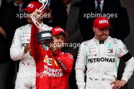 Sebastian Vettel (GER) Ferrari celebrates his second position on the podium. 26.05.2019. Formula 1 World Championship, Rd 6, Monaco Grand Prix, Monte Carlo, Monaco, Race Day.