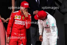 (L to R): Sebastian Vettel (GER) Ferrari on the podium with race winner Lewis Hamilton (GBR) Mercedes AMG F1. 26.05.2019. Formula 1 World Championship, Rd 6, Monaco Grand Prix, Monte Carlo, Monaco, Race Day.