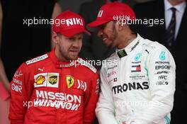 2nd place Sebastian Vettel (GER) Ferrari SF90 and 1st place Lewis Hamilton (GBR) Mercedes AMG F1 W10. 26.05.2019. Formula 1 World Championship, Rd 6, Monaco Grand Prix, Monte Carlo, Monaco, Race Day.