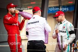 The podium (L to R): Sebastian Vettel (GER) Ferrari celebrates his second position with Ron Meadows (GBR) Mercedes GP Team Manager and third placed Valtteri Bottas (FIN) Mercedes AMG F1. 26.05.2019. Formula 1 World Championship, Rd 6, Monaco Grand Prix, Monte Carlo, Monaco, Race Day.