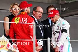 Sebastian Vettel (GER) Ferrari and Valtteri Bottas (FIN) Mercedes AMG F1 on the podium with HSH Prince Albert of Monaco (MON) and Princess Charlene of Monaco. 26.05.2019. Formula 1 World Championship, Rd 6, Monaco Grand Prix, Monte Carlo, Monaco, Race Day.