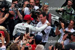 Race winner Lewis Hamilton (GBR) Mercedes AMG F1 celebrates at the podium with Toto Wolff (GER) Mercedes AMG F1 Shareholder and Executive Director. 26.05.2019. Formula 1 World Championship, Rd 6, Monaco Grand Prix, Monte Carlo, Monaco, Race Day.