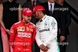 (L to R): second placed Sebastian Vettel (GER) Ferrari on the podium with race winner Lewis Hamilton (GBR) Mercedes AMG F1. 26.05.2019. Formula 1 World Championship, Rd 6, Monaco Grand Prix, Monte Carlo, Monaco, Race Day.