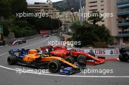 Lando Norris (GBR) McLaren MCL34 and Charles Leclerc (MON) Ferrari SF90. 26.05.2019. Formula 1 World Championship, Rd 6, Monaco Grand Prix, Monte Carlo, Monaco, Race Day.