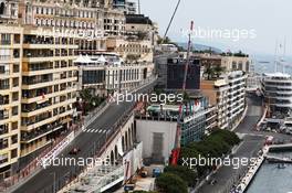 Pierre Gasly (FRA) Red Bull Racing RB15 and Lewis Hamilton (GBR) Mercedes AMG F1 W10. 25.05.2019. Formula 1 World Championship, Rd 6, Monaco Grand Prix, Monte Carlo, Monaco, Qualifying Day.