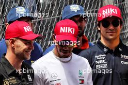 (L to R): Kevin Magnussen (DEN) Haas F1 Team; lhap; and Lance Stroll (CDN) Racing Point F1 Team, on the drivers parade. 26.05.2019. Formula 1 World Championship, Rd 6, Monaco Grand Prix, Monte Carlo, Monaco, Race Day.