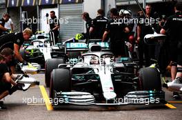 Lewis Hamilton (GBR) Mercedes AMG F1 W10 and Valtteri Bottas (FIN) Mercedes AMG F1 W10 in the pits. 23.05.2019. Formula 1 World Championship, Rd 6, Monaco Grand Prix, Monte Carlo, Monaco, Practice Day.