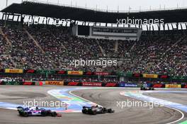 Kevin Magnussen (DEN) Haas VF-19 leads Pierre Gasly (FRA) Scuderia Toro Rosso STR14. 25.10.2019. Formula 1 World Championship, Rd 18, Mexican Grand Prix, Mexico City, Mexico, Practice Day.