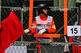 Marshal waves a red flag in the first practice session. 25.10.2019. Formula 1 World Championship, Rd 18, Mexican Grand Prix, Mexico City, Mexico, Practice Day.