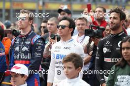 Daniil Kvyat (RUS) Scuderia Toro Rosso STR14 with Sergio Perez (MEX) Racing Point F1 Team RP19 and Daniel Ricciardo (AUS) Renault Sport F1 Team RS19. 27.10.2019. Formula 1 World Championship, Rd 18, Mexican Grand Prix, Mexico City, Mexico, Race Day.