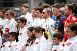 Max Verstappen (NLD) Red Bull Racing as the grid observes the national anthem. 27.10.2019. Formula 1 World Championship, Rd 18, Mexican Grand Prix, Mexico City, Mexico, Race Day.