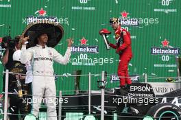 1st place Lewis Hamilton (GBR) Mercedes AMG F1 W10 and Sebastian Vettel (GER) Ferrari SF90. 27.10.2019. Formula 1 World Championship, Rd 18, Mexican Grand Prix, Mexico City, Mexico, Race Day.