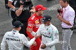 (L to R): Valtteri Bottas (FIN) Mercedes AMG F1 celebrates with race winner Lewis Hamilton (GBR) Mercedes AMG F1 in parc ferme. 27.10.2019. Formula 1 World Championship, Rd 18, Mexican Grand Prix, Mexico City, Mexico, Race Day.
