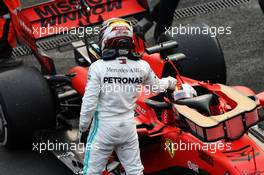 Race winner Lewis Hamilton (GBR) Mercedes AMG F1 W10 celebrates with second placed Sebastian Vettel (GER) Ferrari SF90 in parc ferme. 27.10.2019. Formula 1 World Championship, Rd 18, Mexican Grand Prix, Mexico City, Mexico, Race Day.