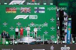 1st place Lewis Hamilton (GBR) Mercedes AMG F1 W10, with Sebastian Vettel (GER) Ferrari SF90 and Valtteri Bottas (FIN) Mercedes AMG F1 W10.  27.10.2019. Formula 1 World Championship, Rd 18, Mexican Grand Prix, Mexico City, Mexico, Race Day.