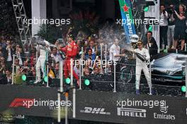 Sebastian Vettel (GER) Ferrari, second; Lewis Hamilton (GBR) Mercedes AMG F1, race winner; Valtteri Bottas (FIN) Mercedes AMG F1, third.                                27.10.2019. Formula 1 World Championship, Rd 18, Mexican Grand Prix, Mexico City, Mexico, Race Day.