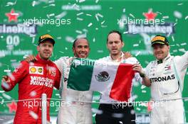 1st place Lewis Hamilton (GBR) Mercedes AMG F1 W10, 2nd place Sebastian Vettel (GER) Ferrari SF90 and 3rd place Valtteri Bottas (FIN) Mercedes AMG F1 W10. 27.10.2019. Formula 1 World Championship, Rd 18, Mexican Grand Prix, Mexico City, Mexico, Race Day.