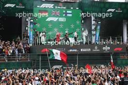 1st place Lewis Hamilton (GBR) Mercedes AMG F1 W10 with 2nd place Sebastian Vettel (GER) Ferrari SF90 and 3rd place Valtteri Bottas (FIN) Mercedes AMG F1 W10. 27.10.2019. Formula 1 World Championship, Rd 18, Mexican Grand Prix, Mexico City, Mexico, Race Day.