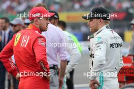 Sebastian Vettel (GER), Scuderia Ferrari and Valtteri Bottas (FIN), Mercedes AMG F1  27.10.2019. Formula 1 World Championship, Rd 18, Mexican Grand Prix, Mexico City, Mexico, Race Day.