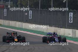 Max Verstappen (NLD) Red Bull Racing RB15 and Daniil Kvyat (RUS) Scuderia Toro Rosso STR14. 27.10.2019. Formula 1 World Championship, Rd 18, Mexican Grand Prix, Mexico City, Mexico, Race Day.