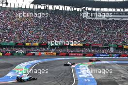 Alexander Albon (THA) Red Bull Racing RB15 leads Pierre Gasly (FRA) Scuderia Toro Rosso STR14 and George Russell (GBR) Williams Racing FW42. 27.10.2019. Formula 1 World Championship, Rd 18, Mexican Grand Prix, Mexico City, Mexico, Race Day.