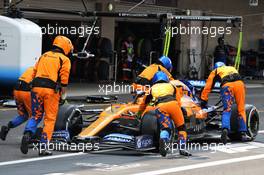 Lando Norris (GBR) McLaren MCL34 pushed back down the pit lane by mechanics during the race. 27.10.2019. Formula 1 World Championship, Rd 18, Mexican Grand Prix, Mexico City, Mexico, Race Day.