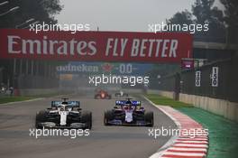 Lewis Hamilton (GBR) Mercedes AMG F1 W10 leads Pierre Gasly (FRA) Toro Rosso. 27.10.2019. Formula 1 World Championship, Rd 18, Mexican Grand Prix, Mexico City, Mexico, Race Day.