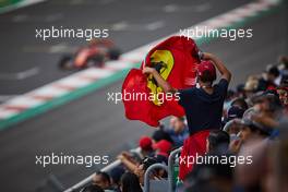 Charles Leclerc (MON) Ferrari SF90 passes a Ferrari fan with flag. 26.10.2019. Formula 1 World Championship, Rd 18, Mexican Grand Prix, Mexico City, Mexico, Qualifying Day.