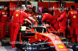 Ferrari SF90 of Sebastian Vettel (GER) Ferrari SF90 worked on by mechanics in the third practice session. 26.10.2019. Formula 1 World Championship, Rd 18, Mexican Grand Prix, Mexico City, Mexico, Qualifying Day.
