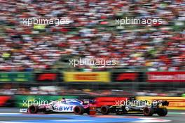 Nico Hulkenberg (GER) Renault F1 Team RS19 and Sergio Perez (MEX) Racing Point F1 Team RP19. 26.10.2019. Formula 1 World Championship, Rd 18, Mexican Grand Prix, Mexico City, Mexico, Qualifying Day.