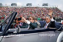 Chase Carey (USA) Formula One Group Chairman with Adrian Fernandez (MEX) on the drivers parade.                                27.10.2019. Formula 1 World Championship, Rd 18, Mexican Grand Prix, Mexico City, Mexico, Race Day.