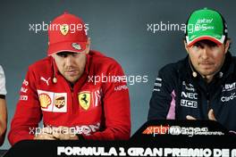 (L to R): Sebastian Vettel (GER) Ferrari with Sergio Perez (MEX) Racing Point F1 Team in the FIA Press Conference. 24.10.2019. Formula 1 World Championship, Rd 18, Mexican Grand Prix, Mexico City, Mexico, Preparation Day.