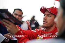 Sebastian Vettel (GER) Ferrari signs autographs for the fans.                                24.10.2019. Formula 1 World Championship, Rd 18, Mexican Grand Prix, Mexico City, Mexico, Preparation Day.