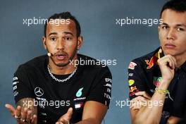 (L to R): Lewis Hamilton (GBR) Mercedes AMG F1 with Alexander Albon (THA) Red Bull Racing in the FIA Press Conference. 24.10.2019. Formula 1 World Championship, Rd 18, Mexican Grand Prix, Mexico City, Mexico, Preparation Day.