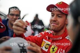Sebastian Vettel (GER) Ferrari signs autographs for the fans.                                24.10.2019. Formula 1 World Championship, Rd 18, Mexican Grand Prix, Mexico City, Mexico, Preparation Day.