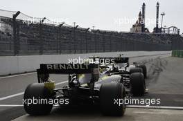 Daniel Ricciardo (AUS) Renault F1 Team RS19 and Nico Hulkenberg (GER) Renault F1 Team RS19 at the pit lane exit. 27.09.2019. Formula 1 World Championship, Rd 16, Russian Grand Prix, Sochi Autodrom, Sochi, Russia, Practice Day.
