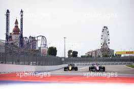 Nico Hulkenberg (GER) Renault F1 Team RS19 and Lance Stroll (CDN) Racing Point F1 Team RP19. 27.09.2019. Formula 1 World Championship, Rd 16, Russian Grand Prix, Sochi Autodrom, Sochi, Russia, Practice Day.