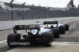 Robert Kubica (POL) Williams Racing FW42 and George Russell (GBR) Williams Racing FW42 at the pit lane exit. 27.09.2019. Formula 1 World Championship, Rd 16, Russian Grand Prix, Sochi Autodrom, Sochi, Russia, Practice Day.