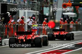 Charles Leclerc (MON) Ferrari SF90 and Sebastian Vettel (GER) Ferrari SF90 leave the pits. 27.09.2019. Formula 1 World Championship, Rd 16, Russian Grand Prix, Sochi Autodrom, Sochi, Russia, Practice Day.