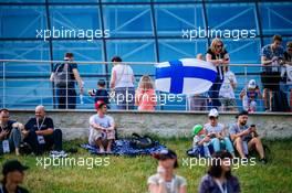 Circuit atmosphere - fans and a Finnish flag. 27.09.2019. Formula 1 World Championship, Rd 16, Russian Grand Prix, Sochi Autodrom, Sochi, Russia, Practice Day.