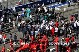 Charles Leclerc (MON) Ferrari SF90 and Lewis Hamilton (GBR) Mercedes AMG F1 W10 on the grid before the start of the race. 29.09.2019. Formula 1 World Championship, Rd 16, Russian Grand Prix, Sochi Autodrom, Sochi, Russia, Race Day.