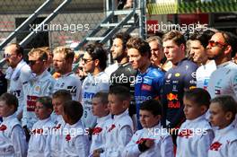 Drivers as the grid observes the national anthem. 29.09.2019. Formula 1 World Championship, Rd 16, Russian Grand Prix, Sochi Autodrom, Sochi, Russia, Race Day.
