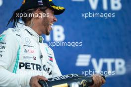 Race winner Lewis Hamilton (GBR) Mercedes AMG F1 celebrates on the podium. 29.09.2019. Formula 1 World Championship, Rd 16, Russian Grand Prix, Sochi Autodrom, Sochi, Russia, Race Day.