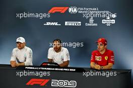 The post race FIA Press Conference (L to R): Valtteri Bottas (FIN) Mercedes AMG F1, second; Lewis Hamilton (GBR) Mercedes AMG F1, race winner; Charles Leclerc (MON) Ferrari, third. 29.09.2019. Formula 1 World Championship, Rd 16, Russian Grand Prix, Sochi Autodrom, Sochi, Russia, Race Day.