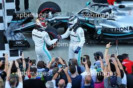Race winner Lewis Hamilton (GBR) Mercedes AMG F1 W10 celebrates in parc ferme with second placed team mate Valtteri Bottas (FIN) Mercedes AMG F1. 29.09.2019. Formula 1 World Championship, Rd 16, Russian Grand Prix, Sochi Autodrom, Sochi, Russia, Race Day.