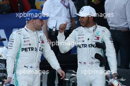 Valtteri Bottas (FIN) Mercedes AMG F1 W10 with 1st place Lewis Hamilton (GBR) Mercedes AMG F1 W10. 29.09.2019. Formula 1 World Championship, Rd 16, Russian Grand Prix, Sochi Autodrom, Sochi, Russia, Race Day.